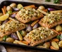 Ugnsbakad lax med gyllene chèvre- och valnötstäcke, potatis och rostade grönsaker